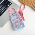 Detail of blue knitted mini bag with floral patterns and pink circular handles - Blue Small Flower (8 Metal Buckle)