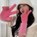 Detailed view of pink knitted touchscreen gloves with soft faux fur cuffs and finger openings - One Size / Hot Pink