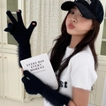 Detail of black knitted gloves with faux fur trim and fingerless touchscreen design - One Size / Black