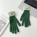 Detail of green knit gloves with fuzzy light green cuffs and a minimal Killdi woven label - One Size / Dark Green