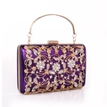 Detail of purple satin clutch with gold hollow floral patterns and sparkling rhinestones - Purple
