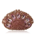 Macro detail of pink crystal rhinestones and marquise cut gems on luxury evening clutch - Champagne Pink