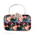 Elegante bolso de noche negro con estampados florales y asa dorada con strass - Negro