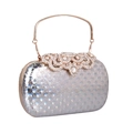 Pochette da sera argento laser con fibbia in strass e manico in metallo - Argento