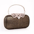 Elegante pochette nera a rete dorata con cristalli e manico decorato - Oro