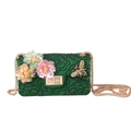 Detail of dark green jelly bag with embossed roses, sequin flowers, and bee patch - Green