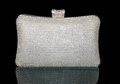 Close-up of a silver rhinestone evening clutch bag with metallic clasp and crystal finish - Silver