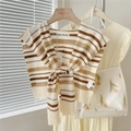 Detail of a beige knitted shawl with colorful stripes and a front tie design - 44X100CM / Beige Camel Stripes
