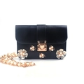 Elegant black PU crossbody bag featuring pearl flower accents and a gold chain strap - Black Box Chain