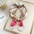 Elegant white satin scarf featuring golden chain patterns and red rose floral prints - Rose Gold Chain Beige