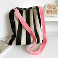Close-up of pleated knit tote bag with black stripes and pink patterned shoulder strap - Black Beige Stripe Pink Strap