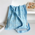 Detail of light blue pleated knit bag with white hollow heart patterns and HSM logo - Blue Hollow Heart