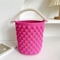 Detail of bright pink popcorn knit texture and faux pearl handle on a tote bag - 20cm x 20cm x 15cm / Rose Red