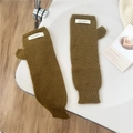 Detail of brownish-green knit fingerless gloves with a JENNIE WOOL woven label on the wrist - One Size / Knit Patch Style / Yellow Oak