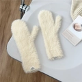 Detailed close-up of fluffy off-white plush mittens with a soft faux fur texture - Off White
