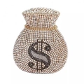 Close-up of money bag clutch featuring crystal rhinestones and golden dollar sign - Gold White