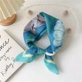 Artistic lake blue cotton linen scarf with abstract floral print tied in a stylish knot - Lake Blue Lotus Leaf