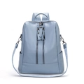 Light blue soft leather backpack for women with double zipper and front pocket design - Blue