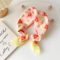 Pink heart pattern cotton linen scarf with yellow checkerboard trim styled as a bow - Heart Checkerboard