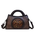 Vintage brown leather crossbody bag with embossed Chinese cloud pattern and round handle - Khaki