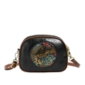 Black leather semicircular crossbody bag with elephant embossing and brown strap - Black