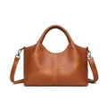 Brown lychee leather tote bag with dual handles and detachable shoulder strap on white - Yellow Brown