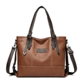 Brown large capacity tote bag with white stitching and detachable strap on white background - Yellow Brown