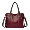 Burgundy PU leather tote bag with white contrast stitching and brown handles - Burgundy