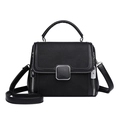 Chic black lychee grain handbag with silver square lock and adjustable strap - Black