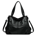 Elegant black lychee grain leather tote bag with silver hardware on white background - Black