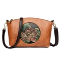 Brown soft leather shell bag with embossed lotus pattern and gold hardware strap - Yellow