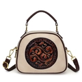 Beige shoulder bag with brown leather strap and embossed traditional wave pattern - Beige