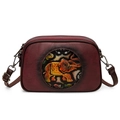 Vintage wine red crossbody bag featuring an embossed elephant pattern and dual zippers - Burgundy