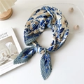 Pleated navy and beige floral silk scarf tied in a loop over minimalist table setting - Geometric Star Blue Leaf