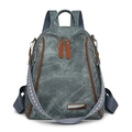 Vintage grey canvas backpack with brown leather accents and multi-zipper compartments - Blue