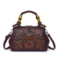 Retro burgundy leather handbag with embossed floral patterns and bamboo handle - Burgundy
