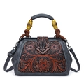 Retro grey Boston bag with red floral embossing and bamboo handle accents - Gray