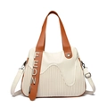 Elegant off-white pleated tote bag with silver lettering and dual shoulder straps - Off White