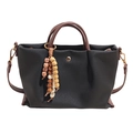 Black canvas tote bag with brown leather handles and wooden bead charm accessory - With Pendant / Black