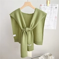 Detail of matcha green 100% wool knitted shawl collar with premium texture and label - 46x115cm / Light Green