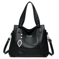 Classic black litchi leather tote bag with dual handles and leaf pearl pendant - Black