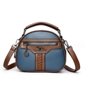 Bolso bandolera azul con grano de lichi, detalles marrones y correa ajustable - Azul
