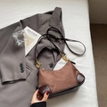 Brown suede underarm bag with vintage leather trim and gold chain on gray blazer - Coffee without Pendant