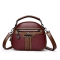 Burgundy lychee grain leather crossbody bag with kangaroo logo and brown top handle - Burgundy