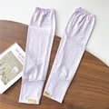 Detail of light purple lace sleeves with jacquard texture and brand tag on wooden desk - One Size / Purple Lace Pattern