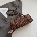Chic cylindrical leopard print shoulder bag with brown strap and gold metal accents - Brown