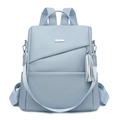 Light blue lychee leather anti-theft backpack with tassels and adjustable straps - Blue