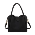 Minimalistische schwarze Beuteltasche mit Lychee-Struktur und goldener Hardware - Schwarz