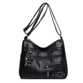 Borsa a tracolla in morbida pelle PU nera con zip multiple e rivetti in argento - Nero