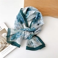 Blue and white floral chiffon scarf with elegant dark green borders in a flat lay view - 35*145cm / Blue & White Floral with Dark Green Trim (Gauze Pompom Scarf)